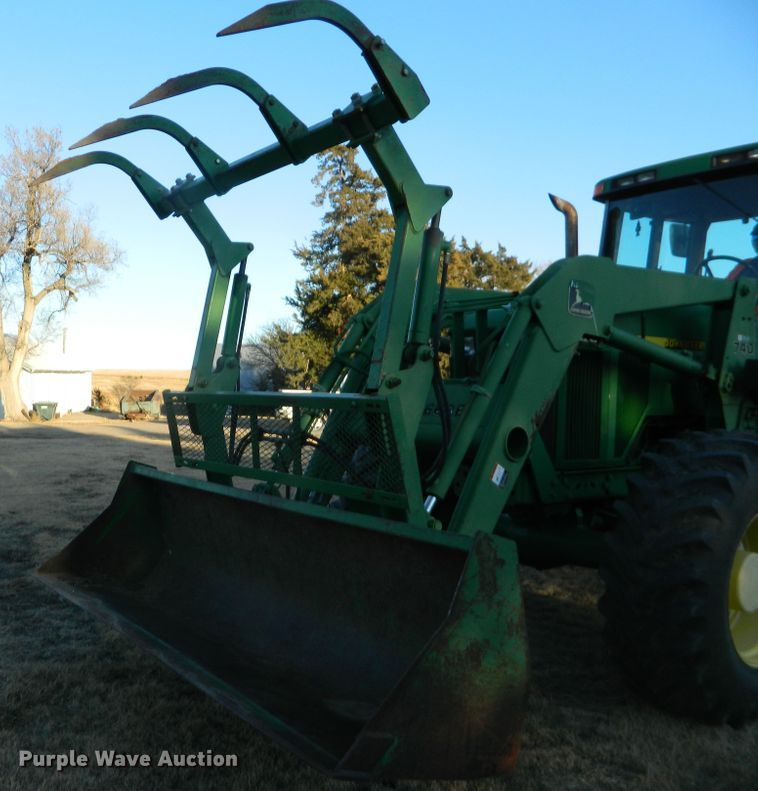 image for item DE4370 2001 John Deere 7610 MFWD tractor