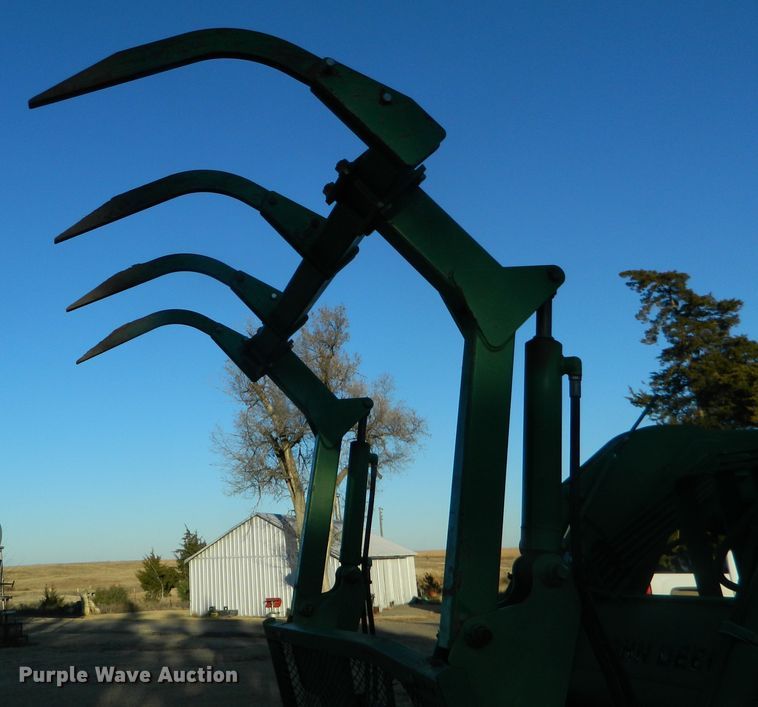 image for item DE4370 2001 John Deere 7610 MFWD tractor