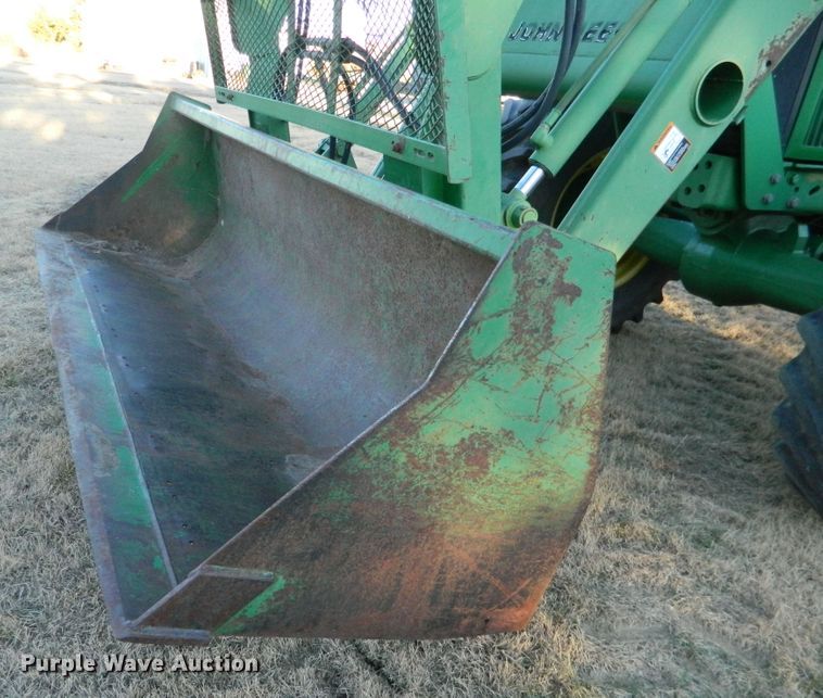 image for item DE4370 2001 John Deere 7610 MFWD tractor