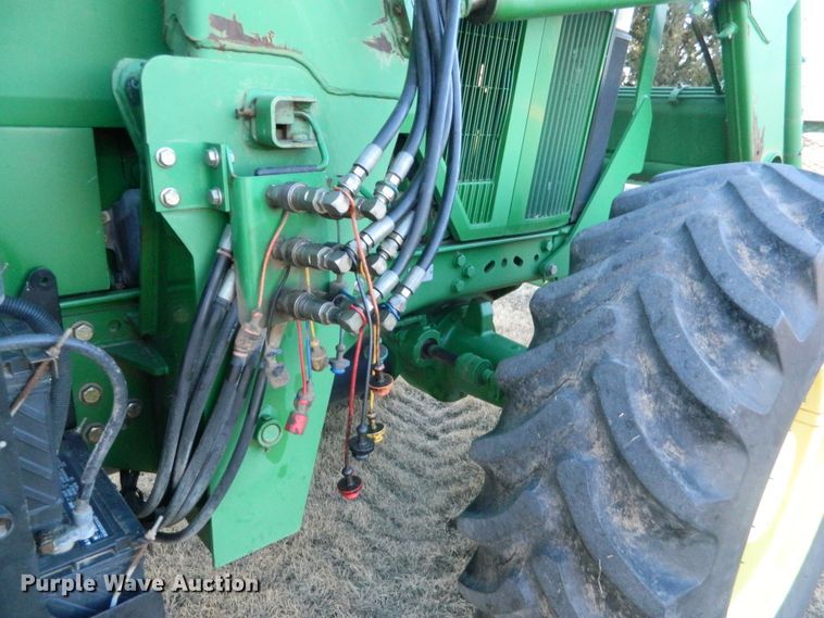image for item DE4370 2001 John Deere 7610 MFWD tractor