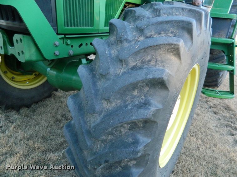 image for item DE4370 2001 John Deere 7610 MFWD tractor