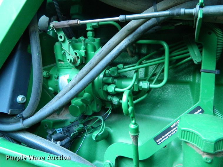 image for item DE4370 2001 John Deere 7610 MFWD tractor