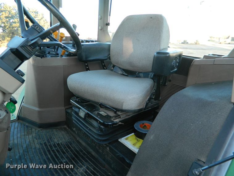 image for item DE4370 2001 John Deere 7610 MFWD tractor