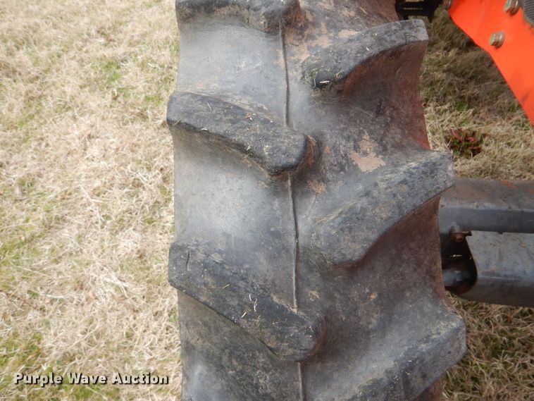 image for item DI2421 Kubota M7040D MFWD tractor