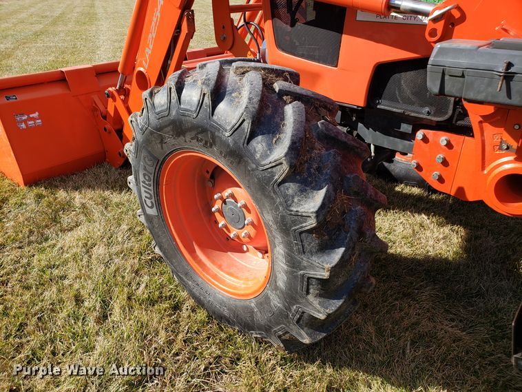 image for item EZ9019 2015 Kubota M135GX MFWD tractor