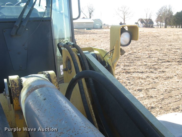 image for item DC1419 2004 John Deere 644J wheel loader