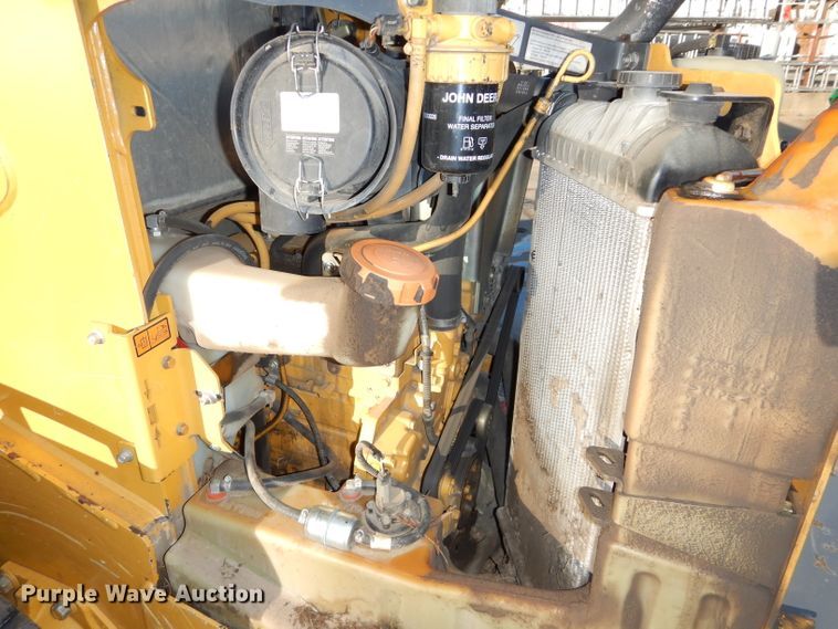 image for item DH4263 2013 John Deere 318D skid steer