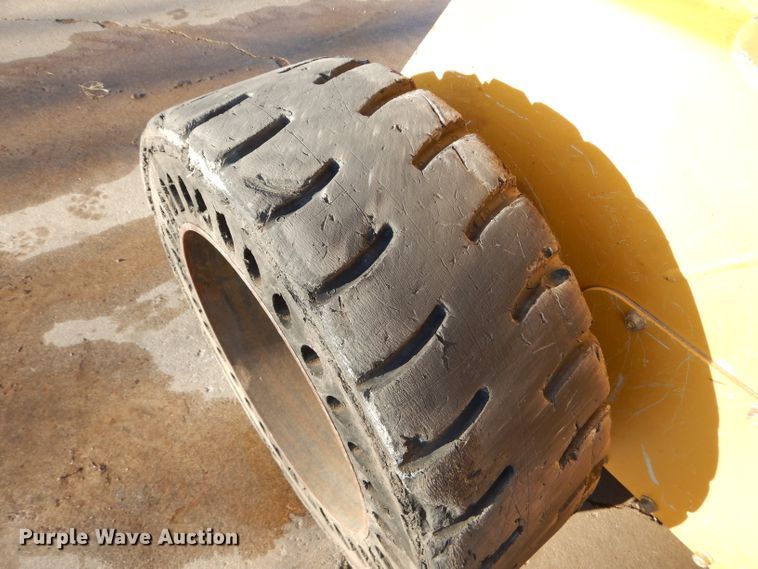 image for item DH4263 2013 John Deere 318D skid steer