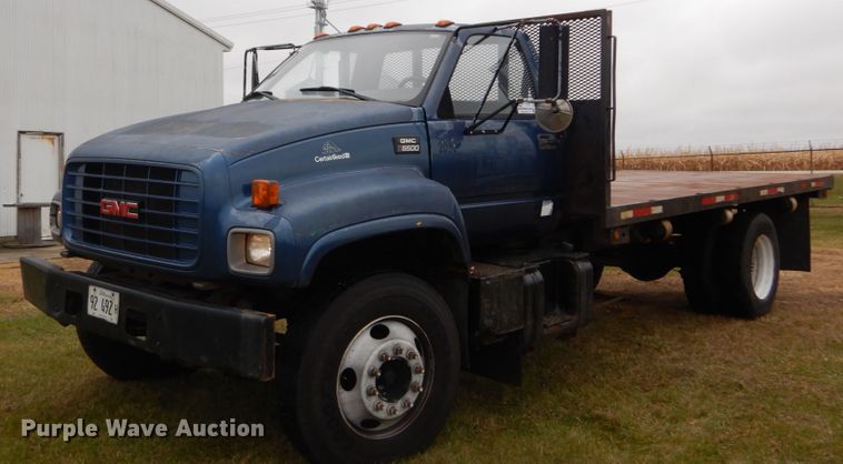 image for item DH5043 2002 GMC C6500 flat dump bed truck