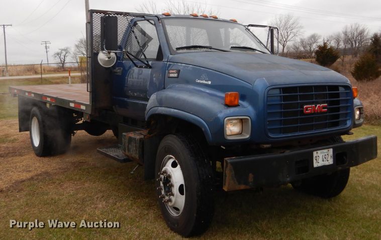 image for item DH5043 2002 GMC C6500 flat dump bed truck