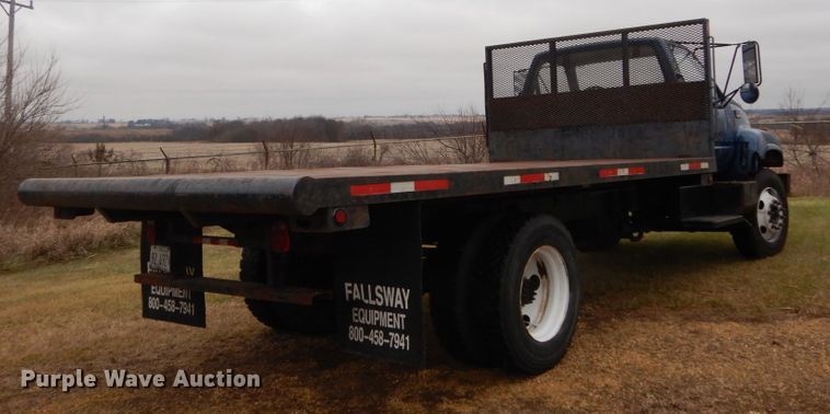 image for item DH5043 2002 GMC C6500 flat dump bed truck