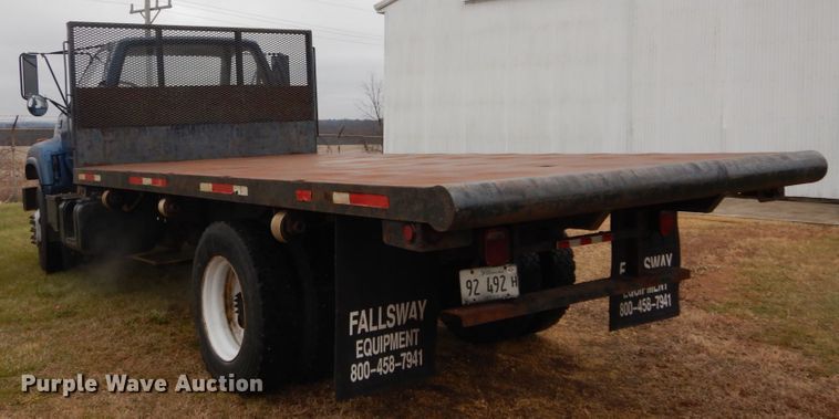 image for item DH5043 2002 GMC C6500 flat dump bed truck