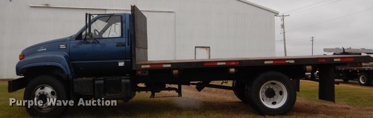 image for item DH5043 2002 GMC C6500 flat dump bed truck