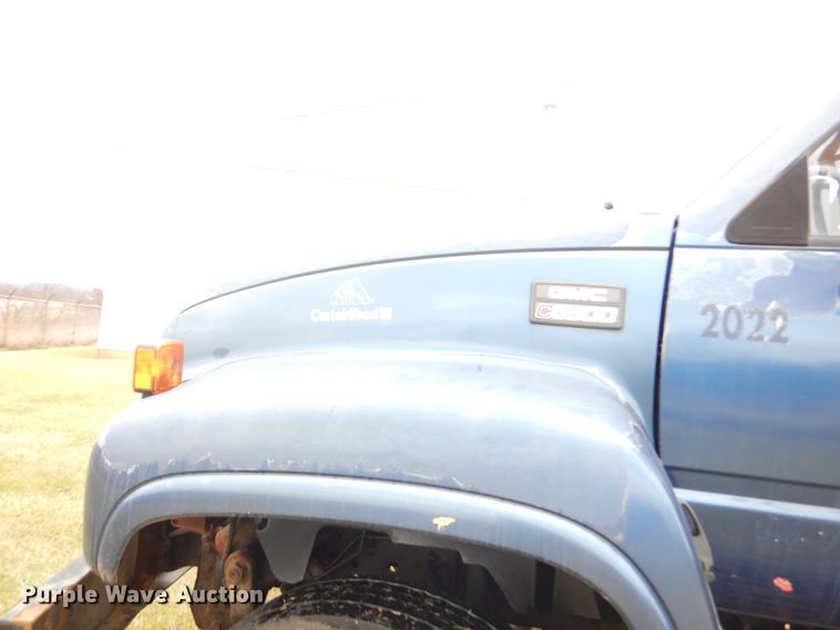 image for item DH5043 2002 GMC C6500 flat dump bed truck