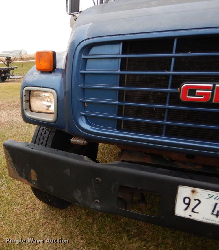 image for item DH5043 2002 GMC C6500 flat dump bed truck