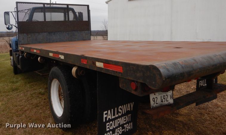 image for item DH5043 2002 GMC C6500 flat dump bed truck