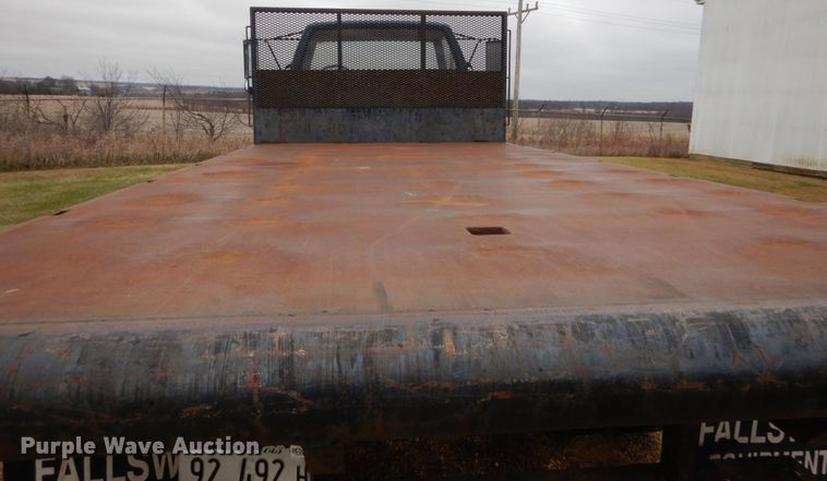 image for item DH5043 2002 GMC C6500 flat dump bed truck