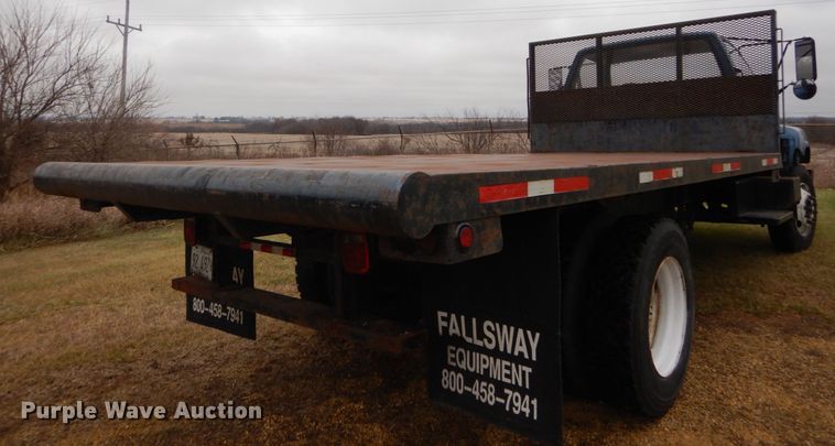 image for item DH5043 2002 GMC C6500 flat dump bed truck
