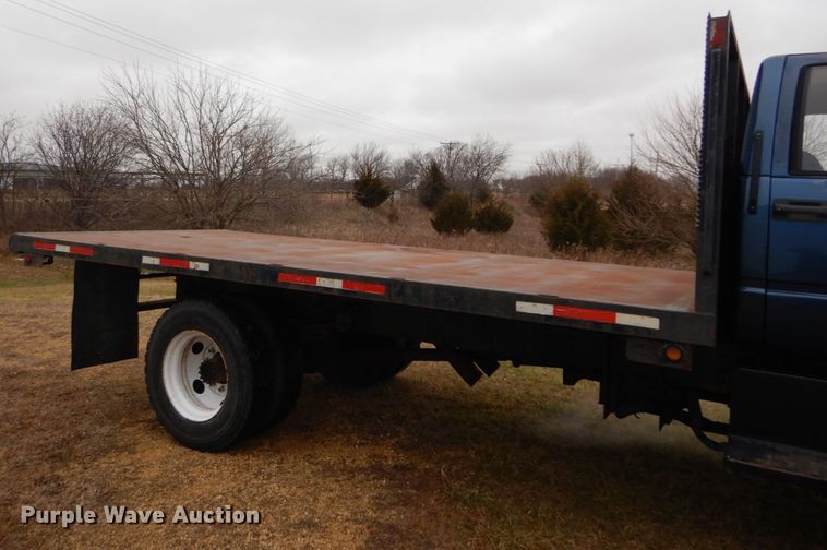 image for item DH5043 2002 GMC C6500 flat dump bed truck