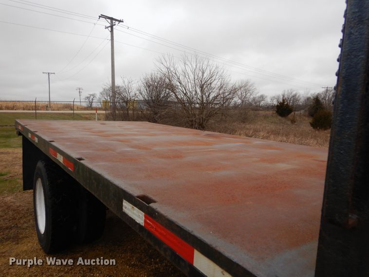 image for item DH5043 2002 GMC C6500 flat dump bed truck