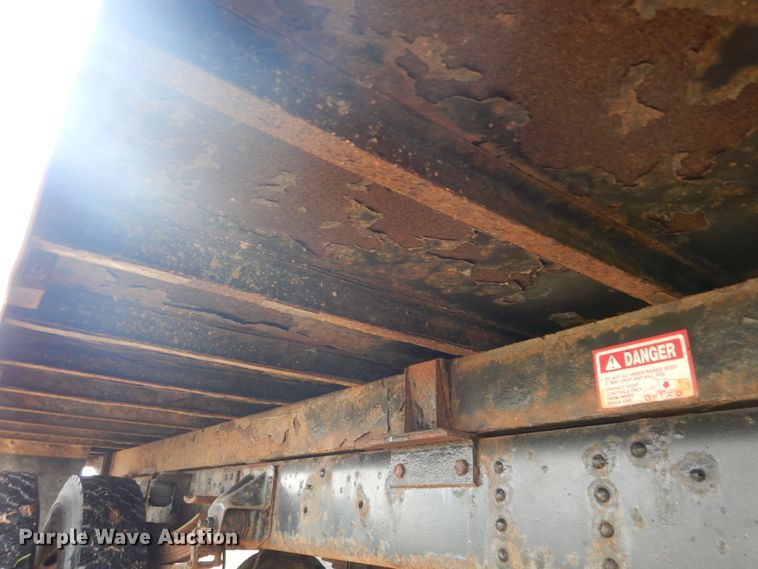 image for item DH5043 2002 GMC C6500 flat dump bed truck