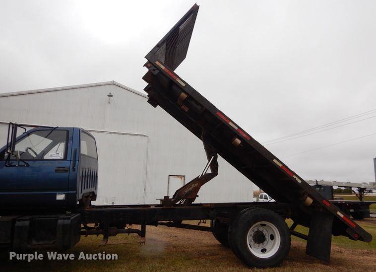 image for item DH5043 2002 GMC C6500 flat dump bed truck