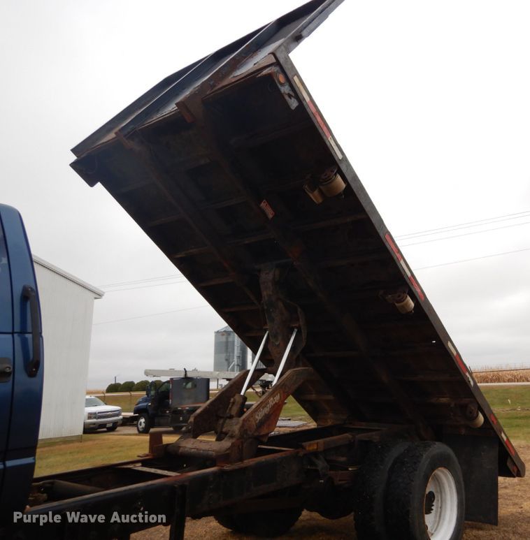 image for item DH5043 2002 GMC C6500 flat dump bed truck