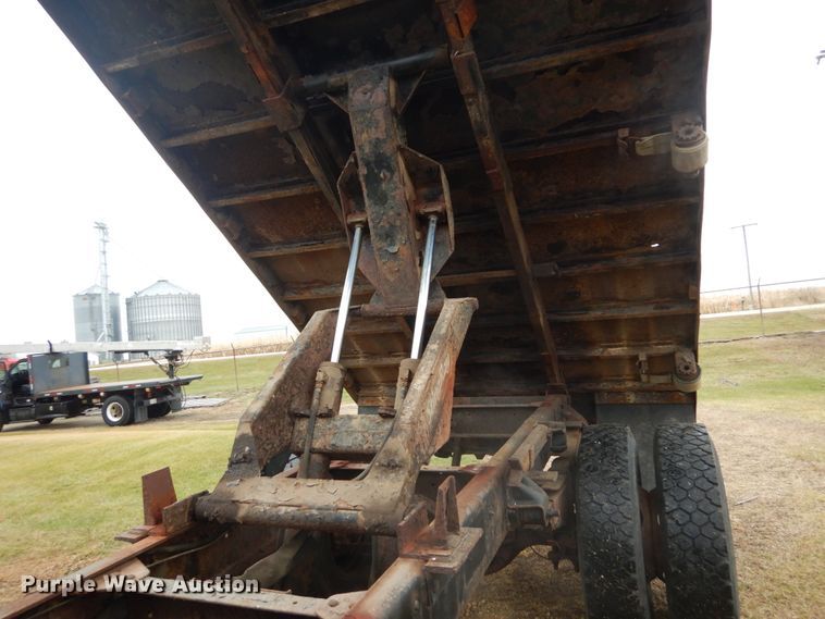 image for item DH5043 2002 GMC C6500 flat dump bed truck