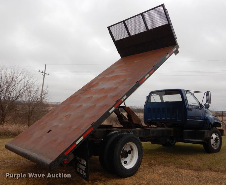 image for item DH5043 2002 GMC C6500 flat dump bed truck