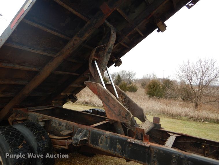 image for item DH5043 2002 GMC C6500 flat dump bed truck