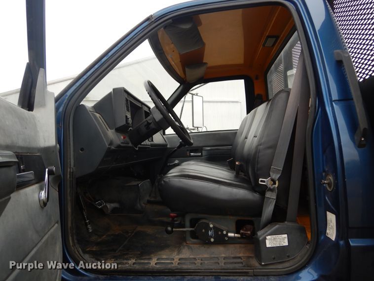 image for item DH5043 2002 GMC C6500 flat dump bed truck