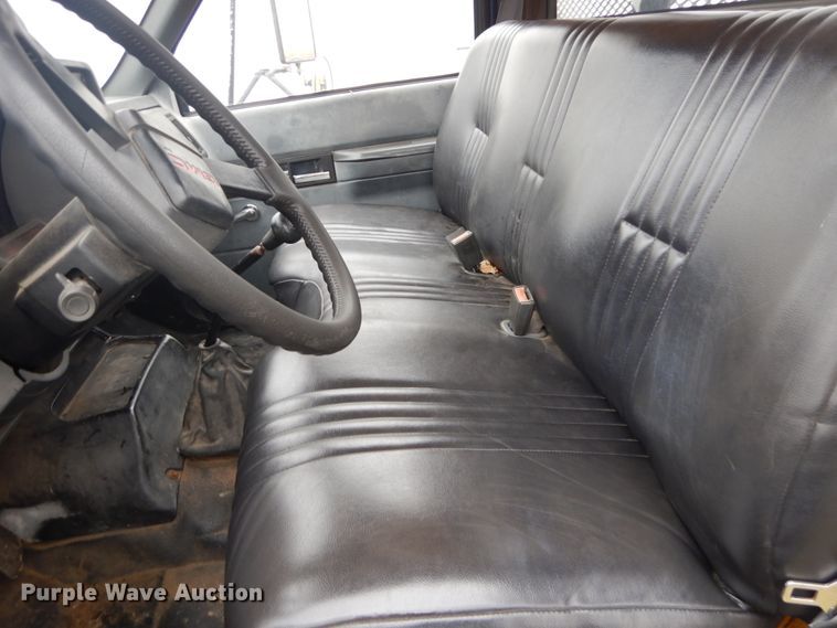 image for item DH5043 2002 GMC C6500 flat dump bed truck