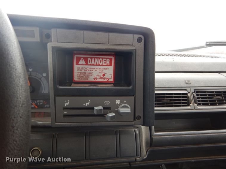 image for item DH5043 2002 GMC C6500 flat dump bed truck