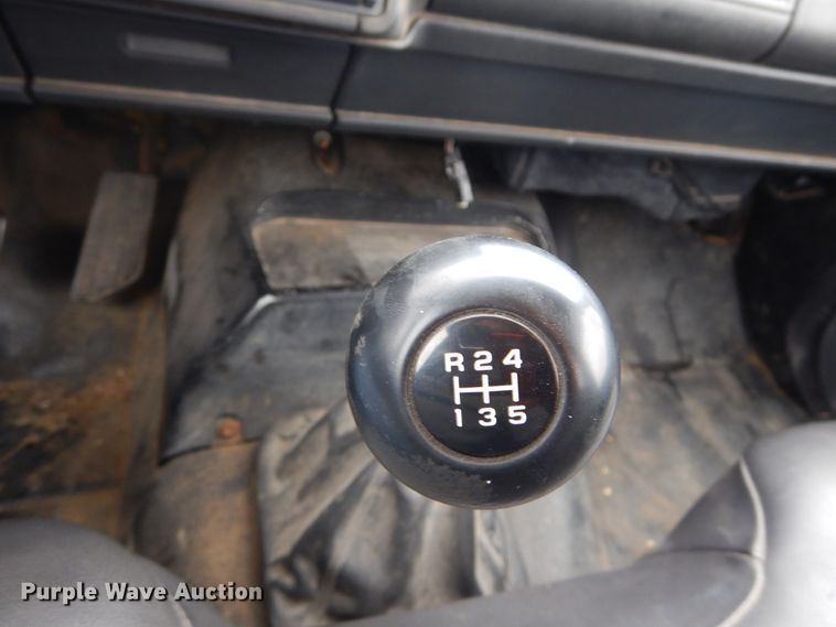 image for item DH5043 2002 GMC C6500 flat dump bed truck