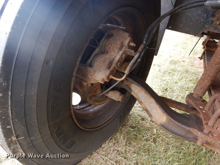 image for item DH5043 2002 GMC C6500 flat dump bed truck