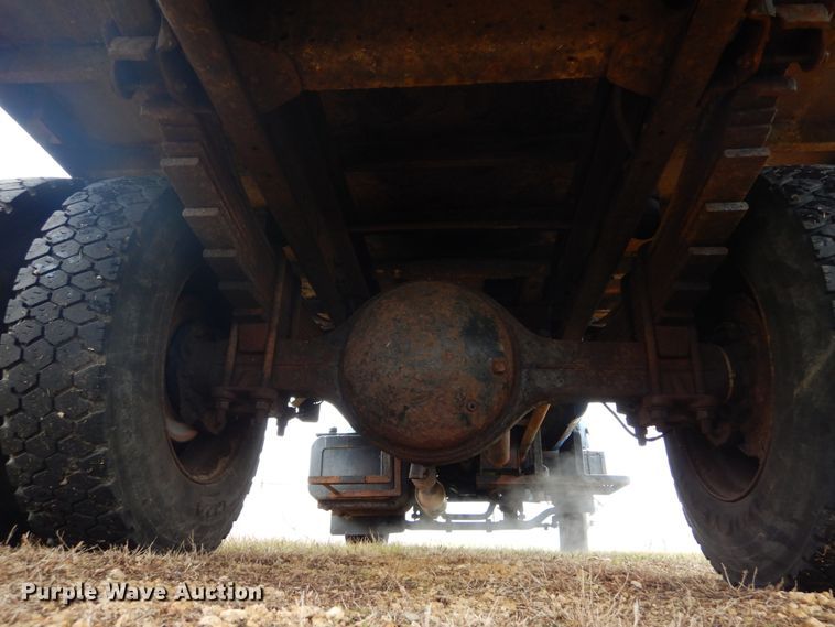 image for item DH5043 2002 GMC C6500 flat dump bed truck