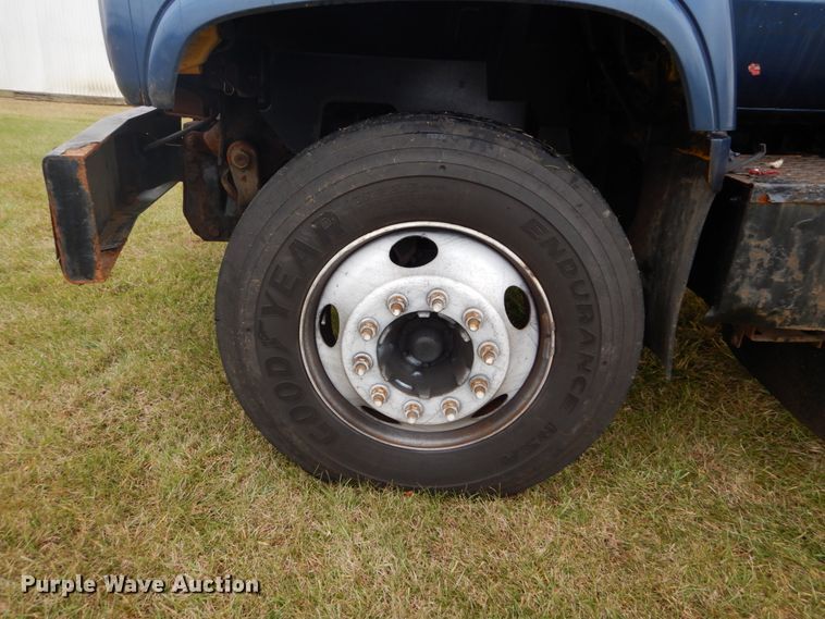 image for item DH5043 2002 GMC C6500 flat dump bed truck