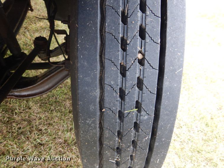 image for item DH5043 2002 GMC C6500 flat dump bed truck