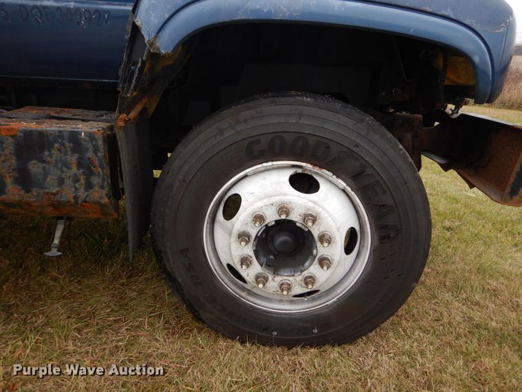 image for item DH5043 2002 GMC C6500 flat dump bed truck