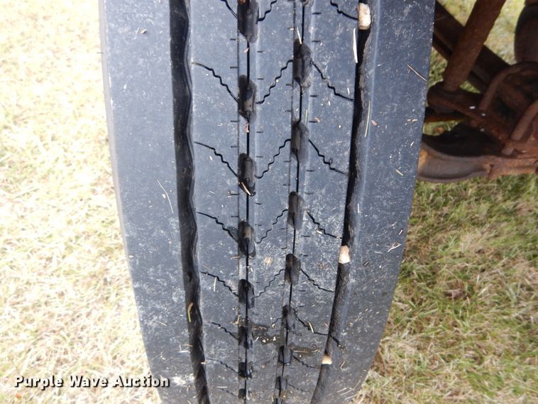 image for item DH5043 2002 GMC C6500 flat dump bed truck