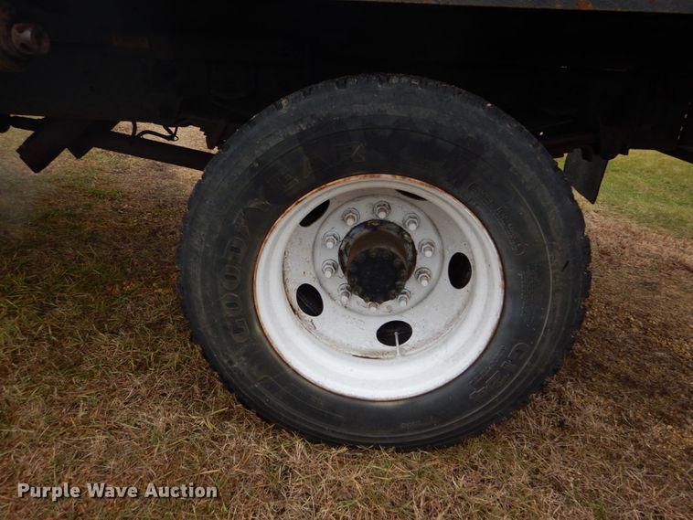 image for item DH5043 2002 GMC C6500 flat dump bed truck