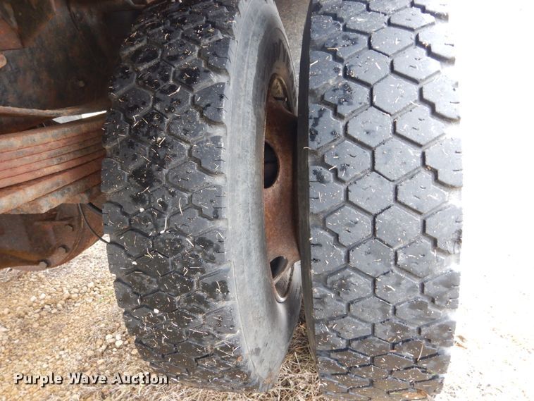 image for item DH5043 2002 GMC C6500 flat dump bed truck