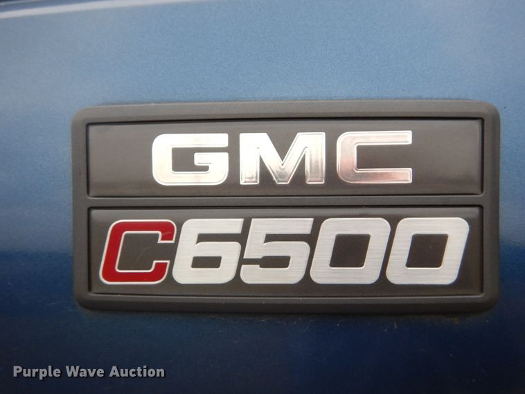 image for item DH5043 2002 GMC C6500 flat dump bed truck