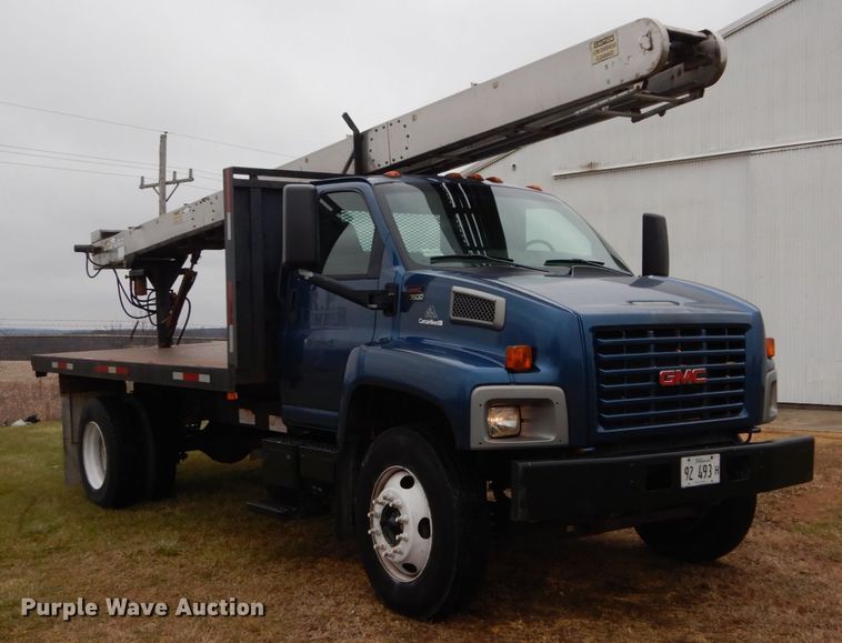 image for item DH5044 2003 GMC C7500 flat dump bed truck with conveyor