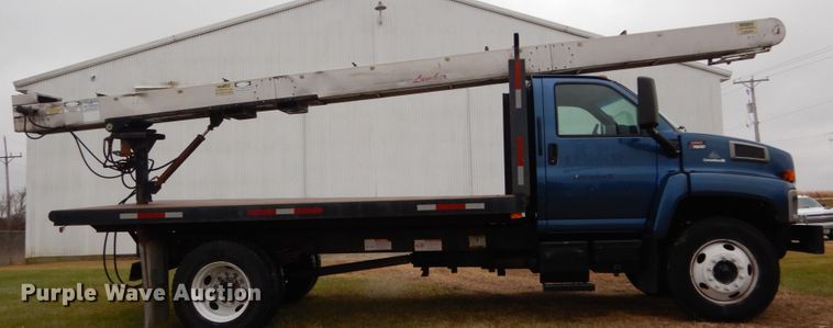 image for item DH5044 2003 GMC C7500 flat dump bed truck with conveyor