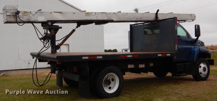 image for item DH5044 2003 GMC C7500 flat dump bed truck with conveyor