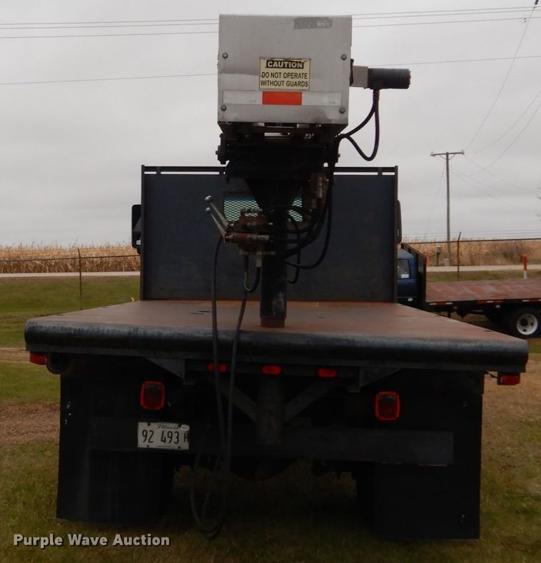 image for item DH5044 2003 GMC C7500 flat dump bed truck with conveyor