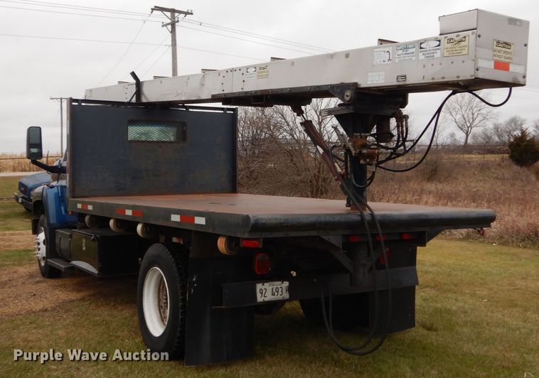image for item DH5044 2003 GMC C7500 flat dump bed truck with conveyor