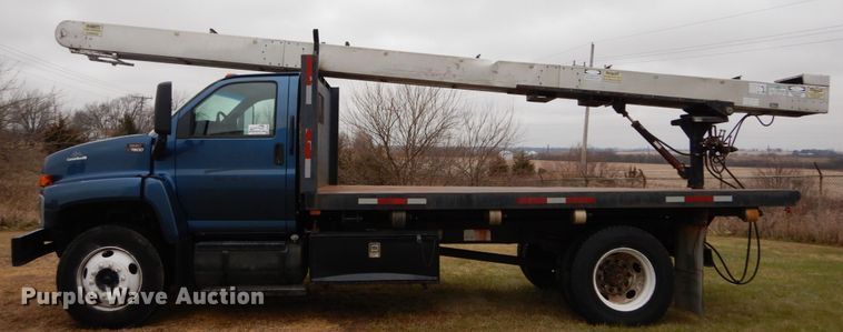 image for item DH5044 2003 GMC C7500 flat dump bed truck with conveyor