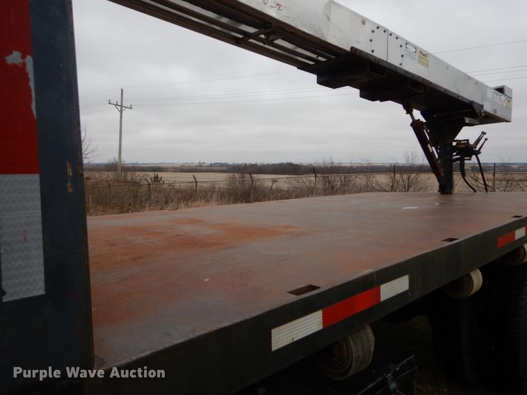 image for item DH5044 2003 GMC C7500 flat dump bed truck with conveyor